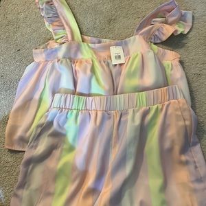 Two piece short and tank set never worn pink/purple/yellow stripped size medium